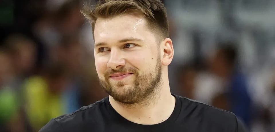 Basketball player smiling during warm-up session