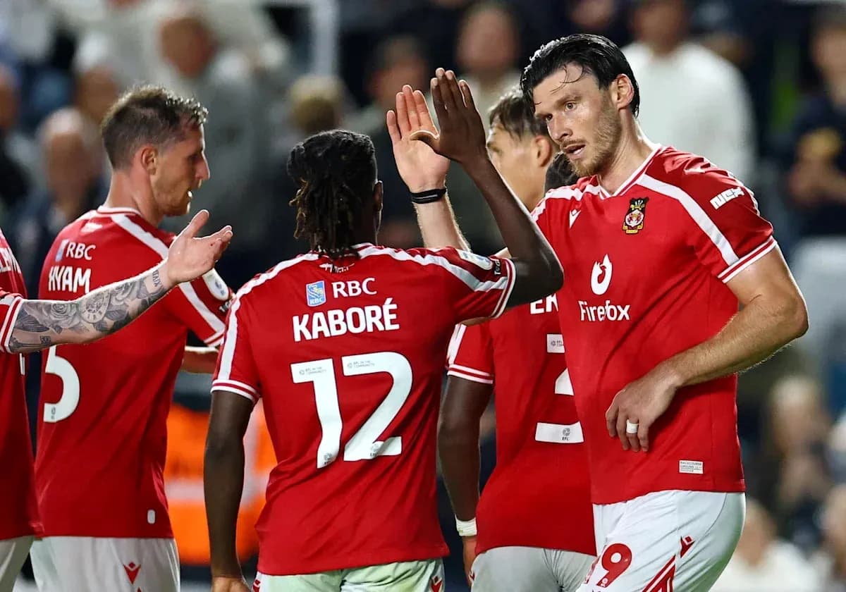 Players celebrating together after a goal