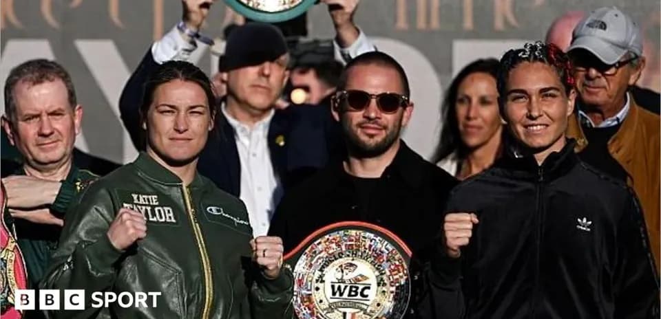 Boxers Katie Taylor and challenger posing at weigh-in