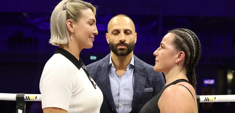 Two fighters facing off before the match