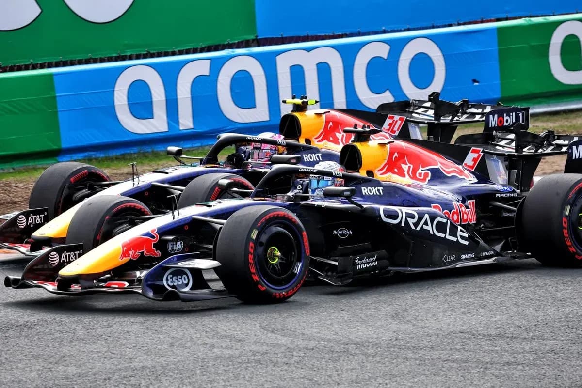 Two Red Bull Racing cars competing on track