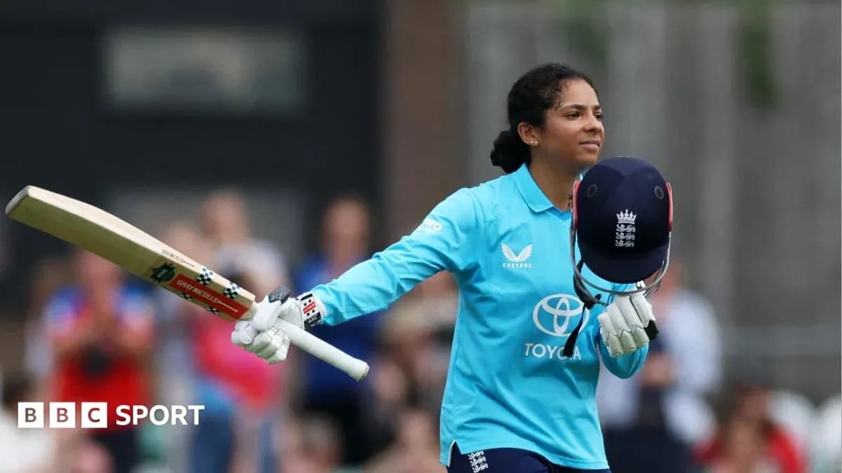 Batter celebrating with helmet and bat during match