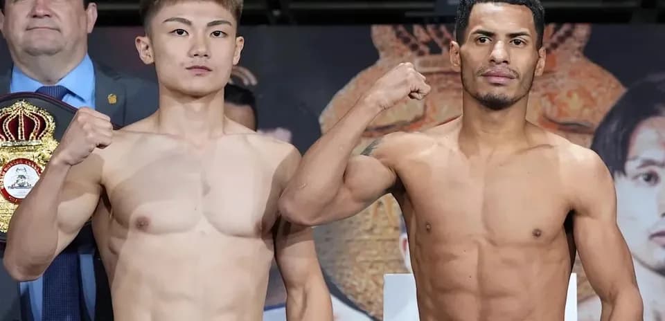 Two boxers posing during official weigh-in event