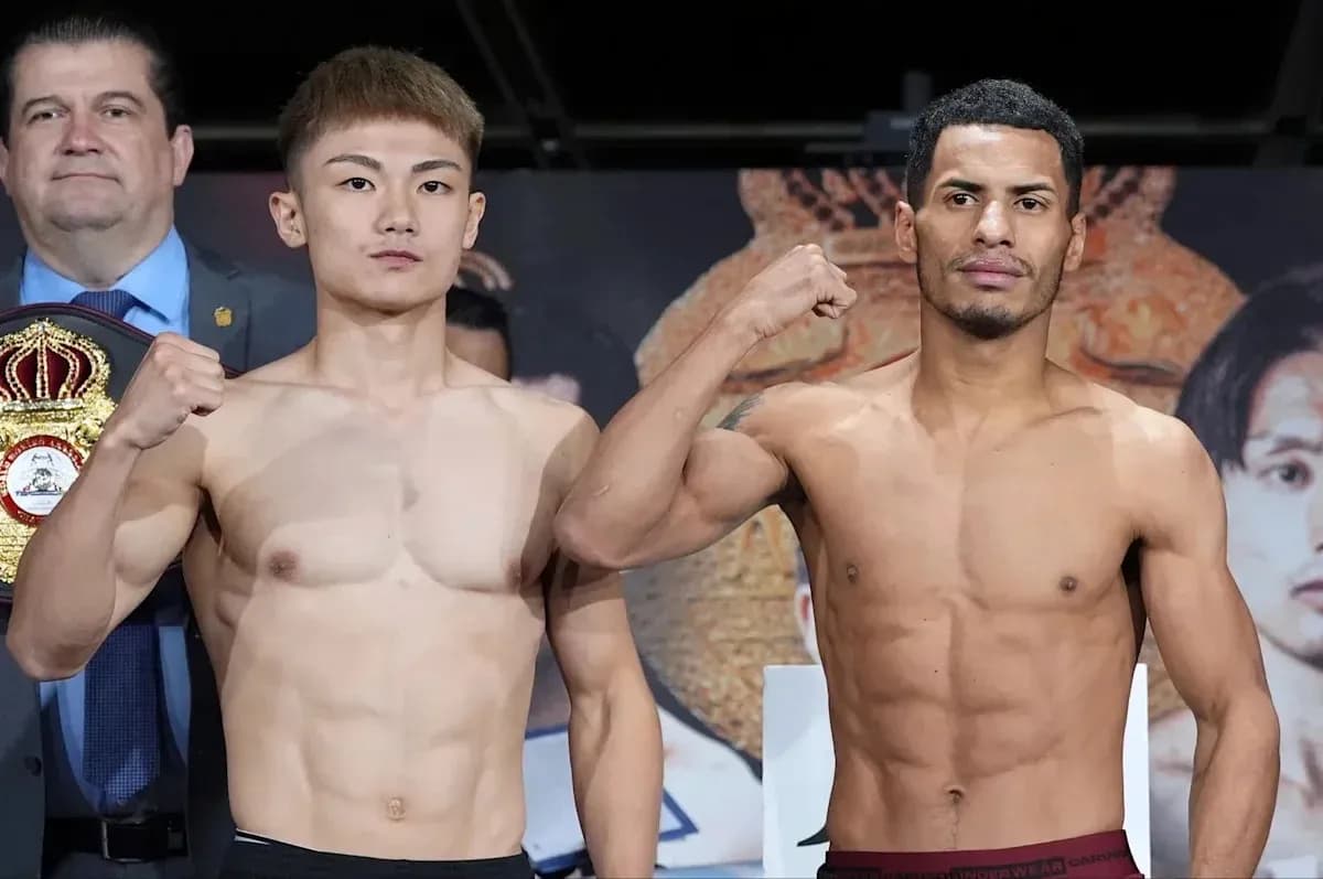 Two boxers posing during official weigh-in event