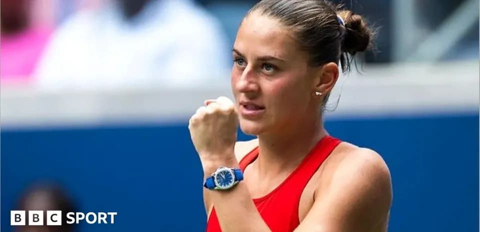 Tennis player celebrating with a clenched fist