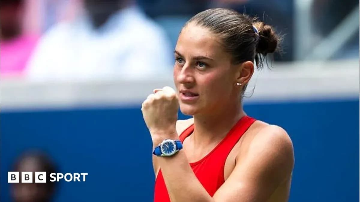 Tennis player celebrating with a clenched fist