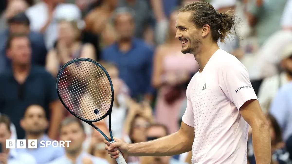 Tennis player celebrating with racket during match