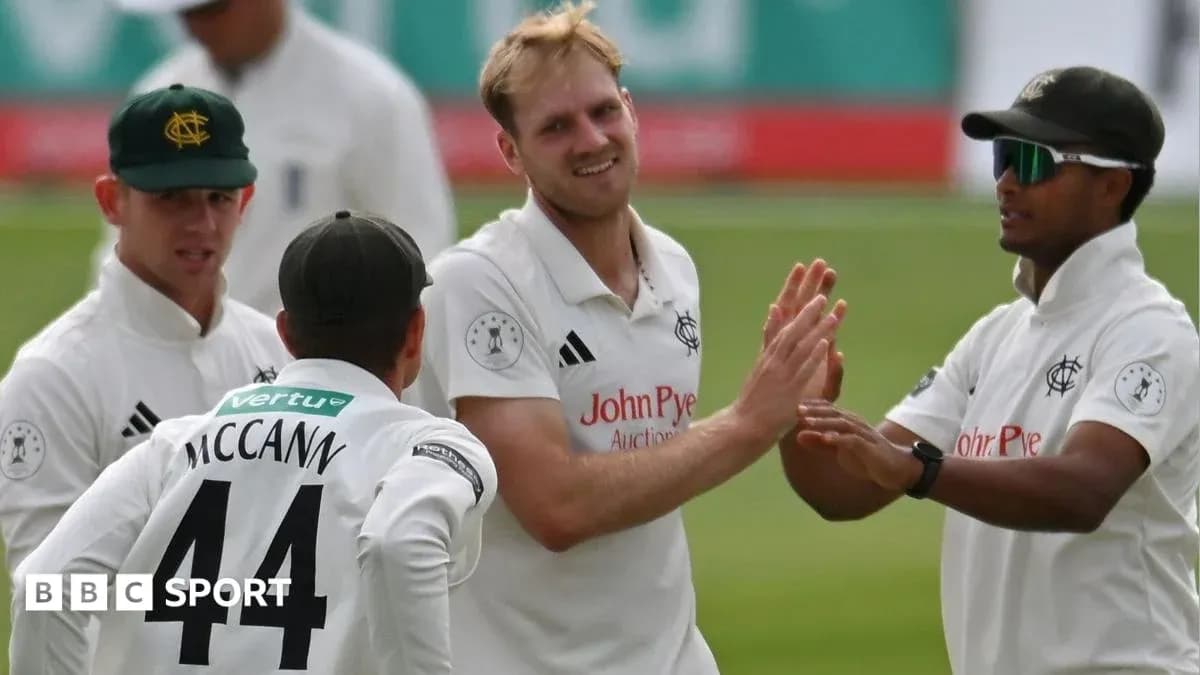 Cricket players celebrating a wicket on field