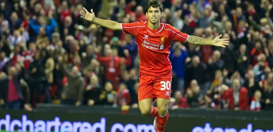 Player celebrating a goal in Liverpool jersey