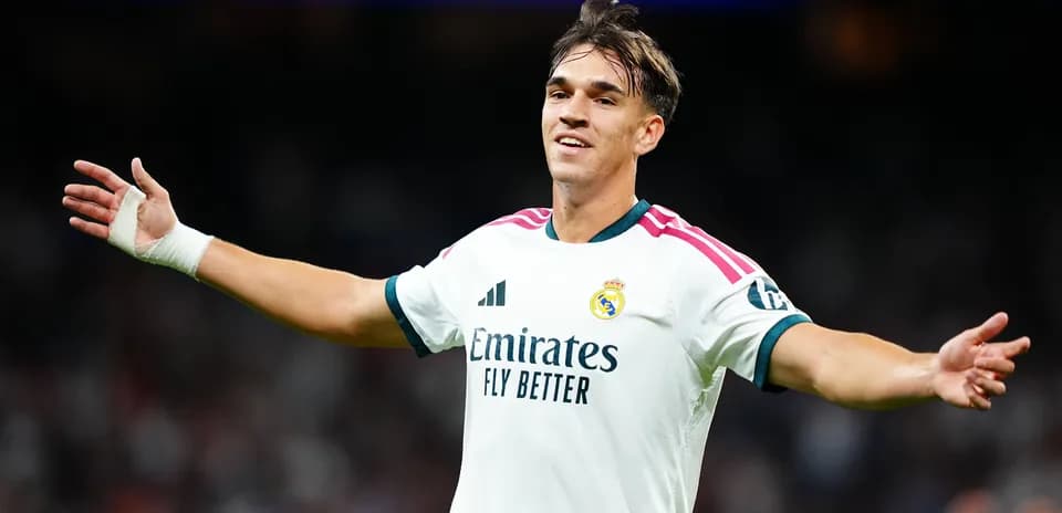 Player celebrating in Real Madrid jersey during match