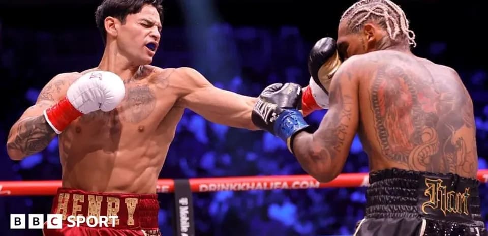 Boxer landing a punch during a match