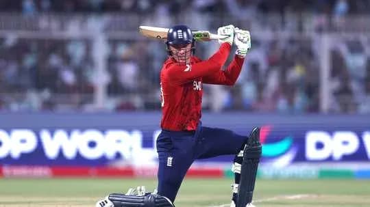 Batsman playing a shot during cricket match