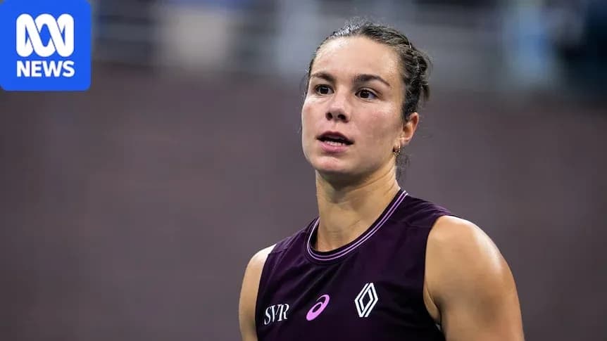 Athlete in purple uniform during competition