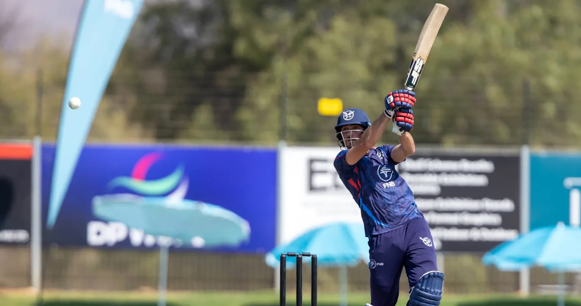 Batsman hitting a cricket ball during practice session