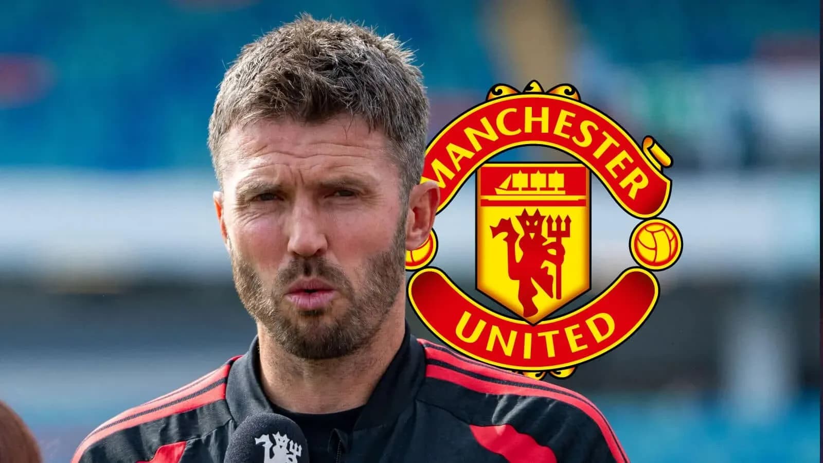 Coach speaking during a press conference at Manchester United