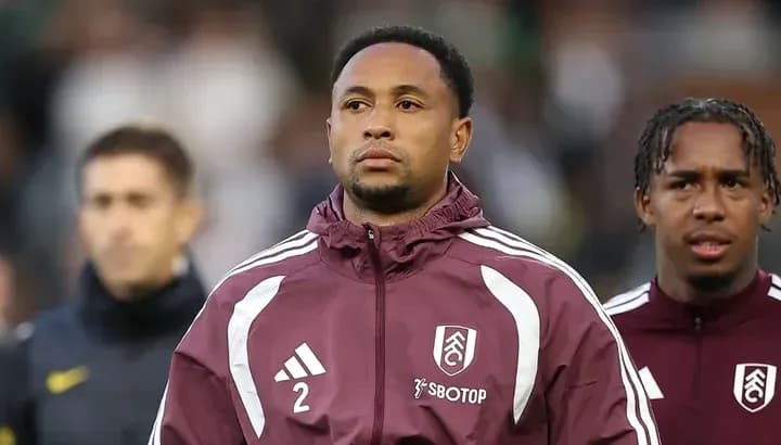 Fulham players in warm-up jackets before match