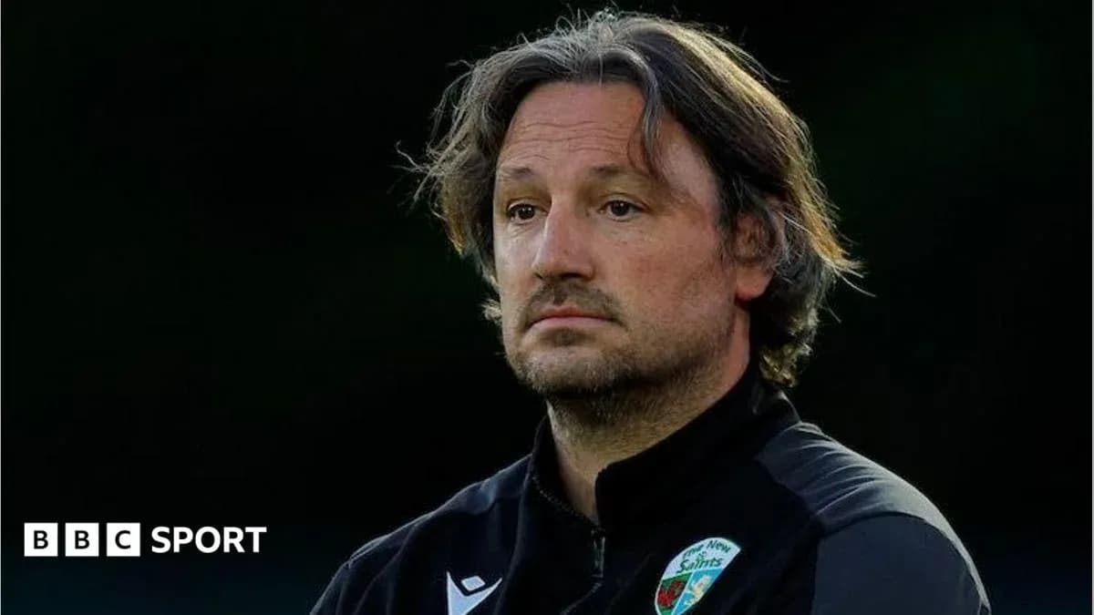 Coach observing match during training session