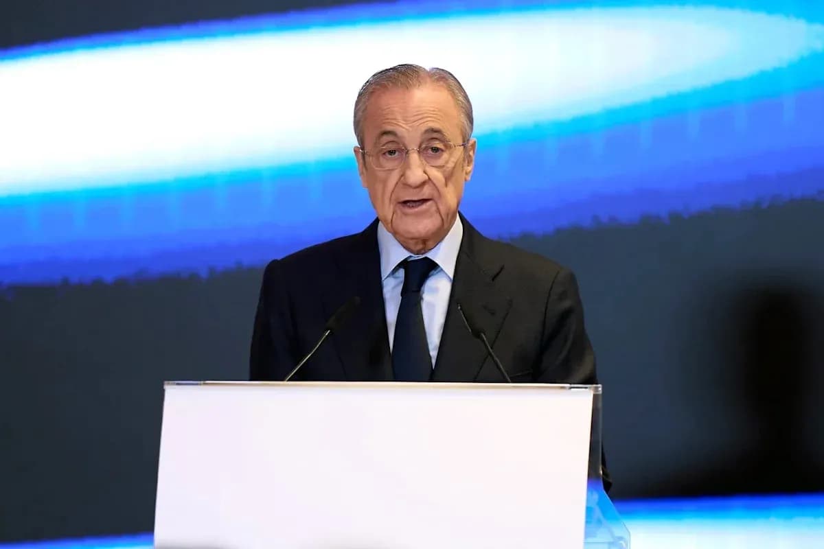 Speaker addressing audience at podium with microphones