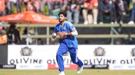 Bowler running on field during cricket match