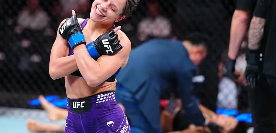 Fighter celebrating victory after MMA match