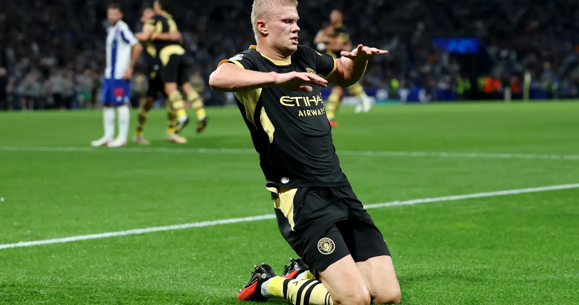 Player celebrating on the field after scoring goal