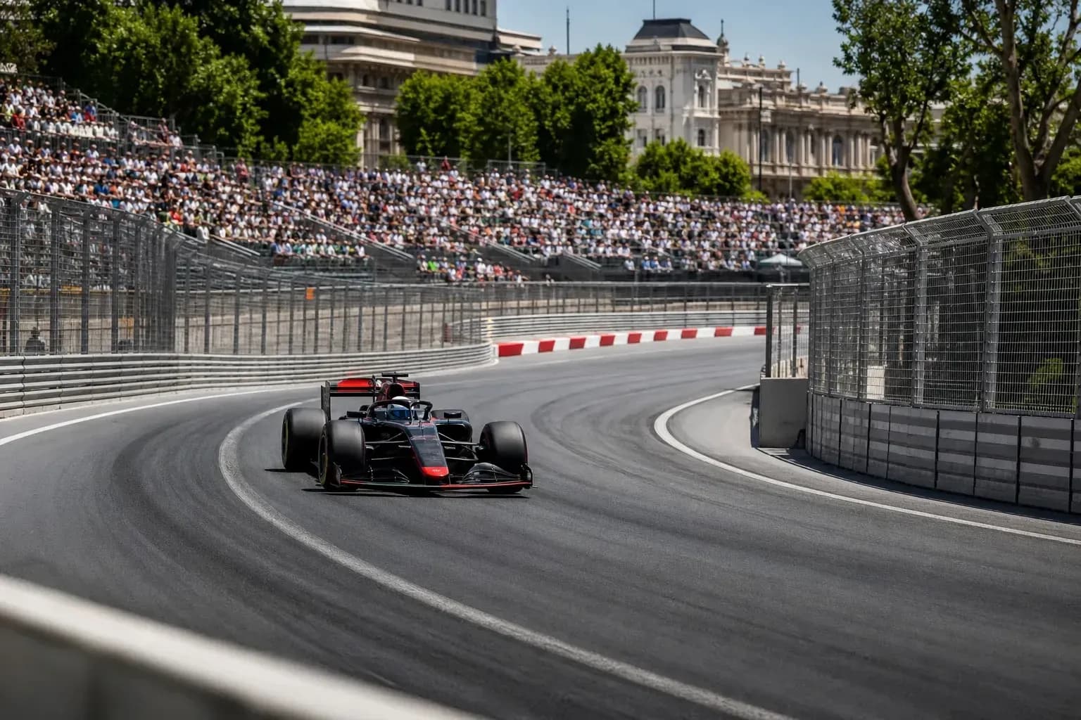 Formula 1 car navigating a turn on the circuit