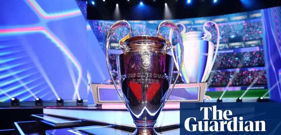 UEFA Champions League trophy displayed on stage