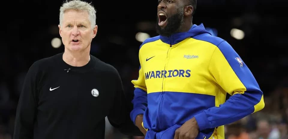 Coach and player discussing during game warm-up