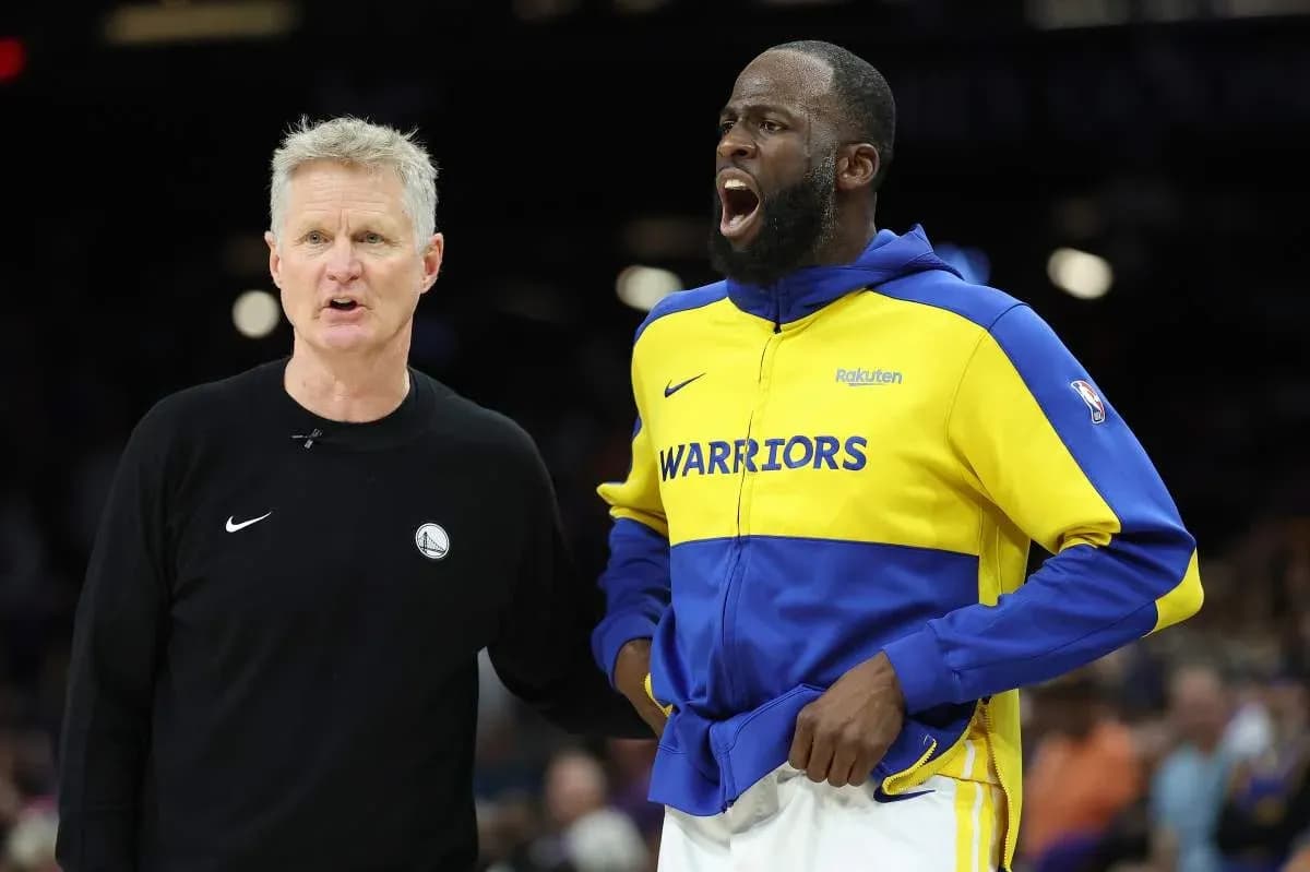 Coach and player discussing during game warm-up