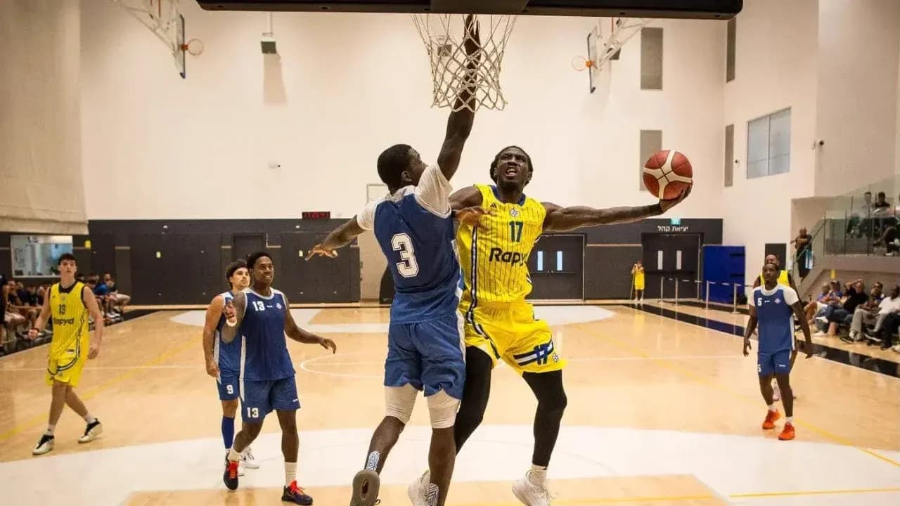 Player dunking the basketball during a game