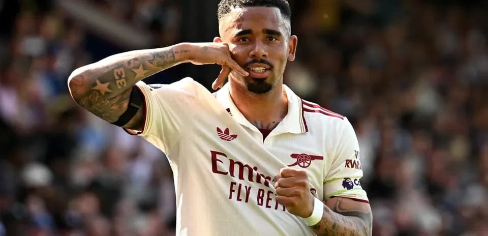 Player celebrating a goal with a phone gesture