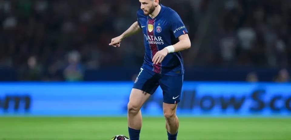 Player dribbling the ball on the field