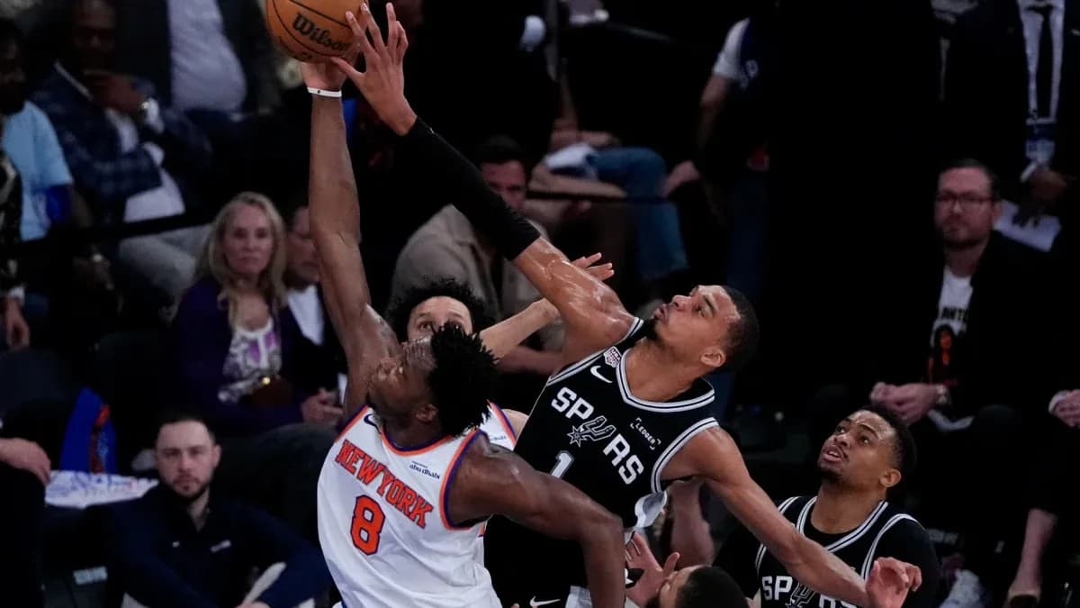 Player attempting a shot amid defensive pressure