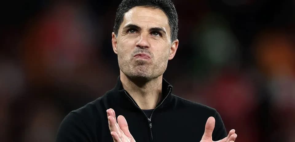 Coach clapping and acknowledging fans after match