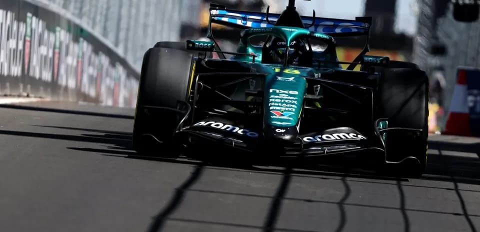 Formula 1 car racing on street circuit track