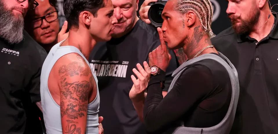 Boxers facing off during weigh-in event
