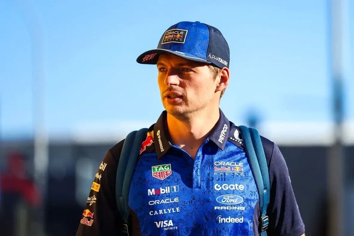 Driver in team uniform walking with backpack