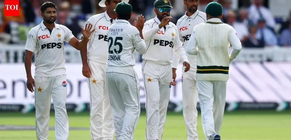 Pakistani cricket players celebrating a wicket on field