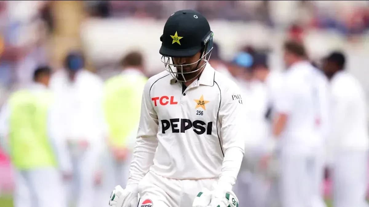 Cricketer walking off the field after dismissal
