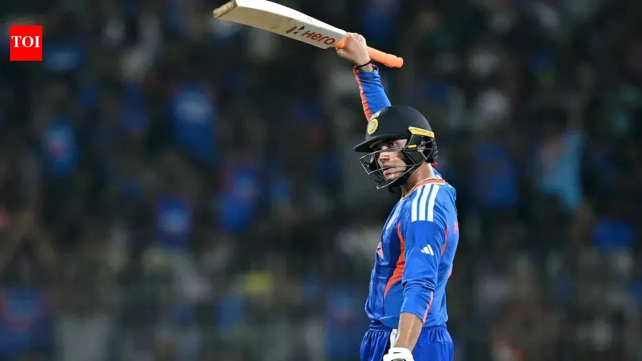 Cricketer celebrating after scoring a century