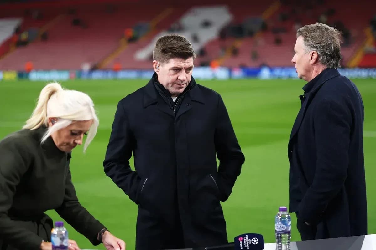 Analysts discussing on the pitch before match
