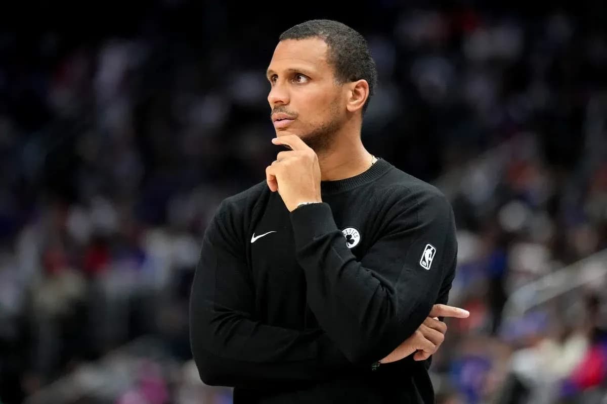 Coach observing game from the sideline