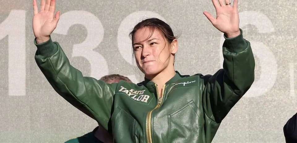 Katie Taylor waving during promotional event