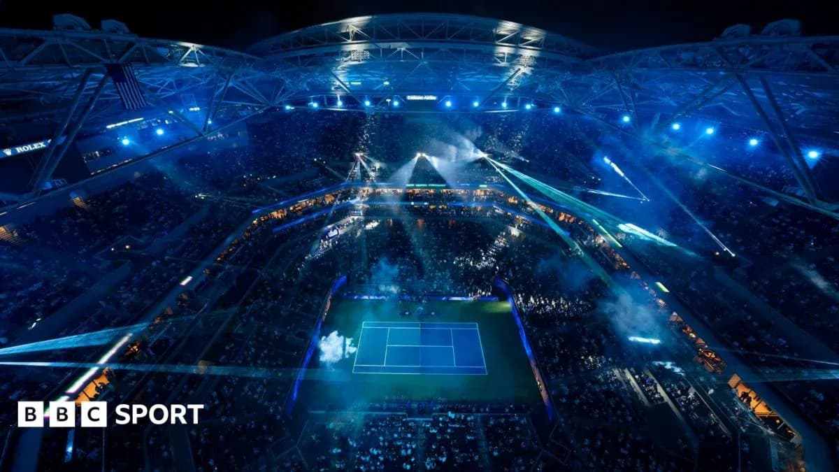 Aerial view of illuminated tennis stadium at night