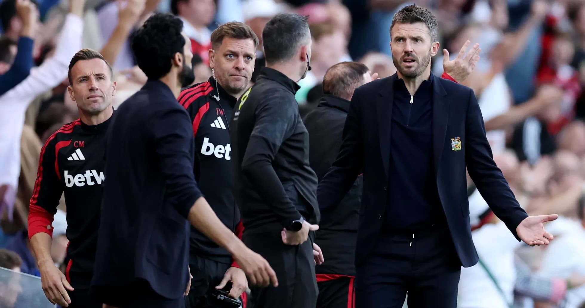 Coaches reacting during a tense match situation