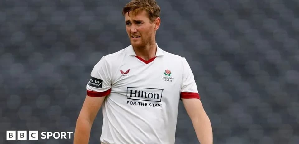 Cricketer wearing Lancashire kit on the field