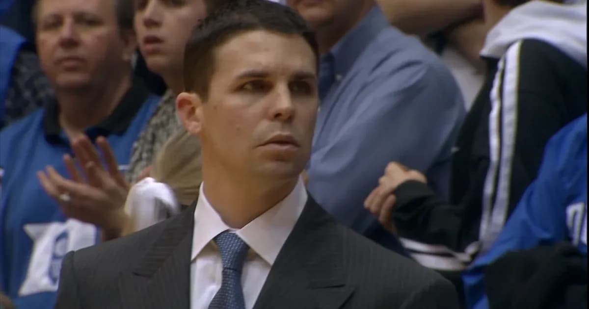 Coach observing the game from the sidelines