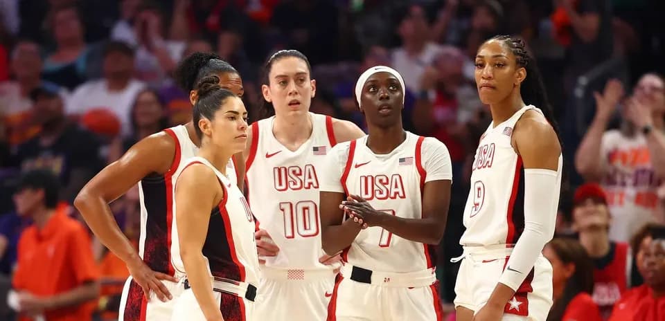 USA women's basketball team during a game timeout