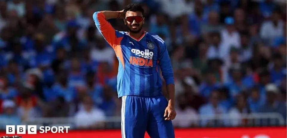 Cricketer gesturing during match in stadium