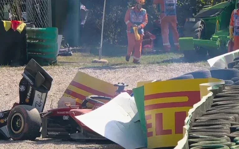 Car crashed into barriers with track officials present